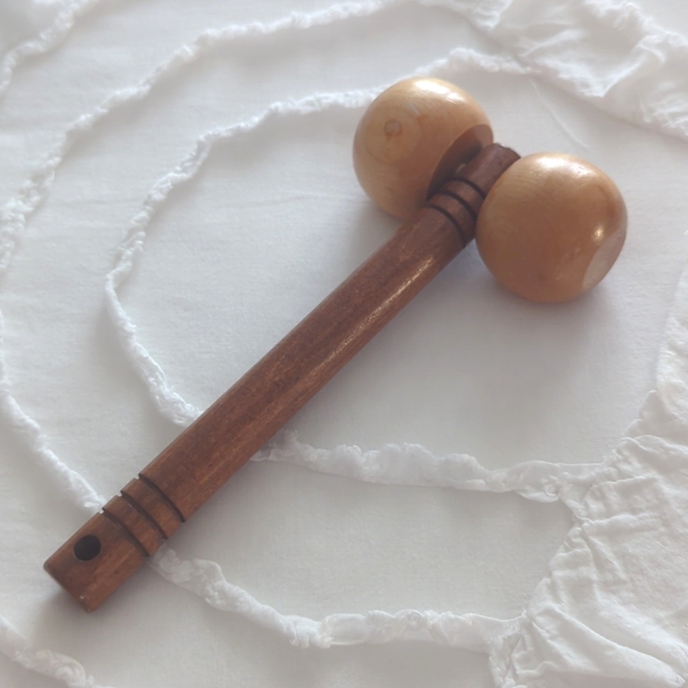 Wooden massage roller